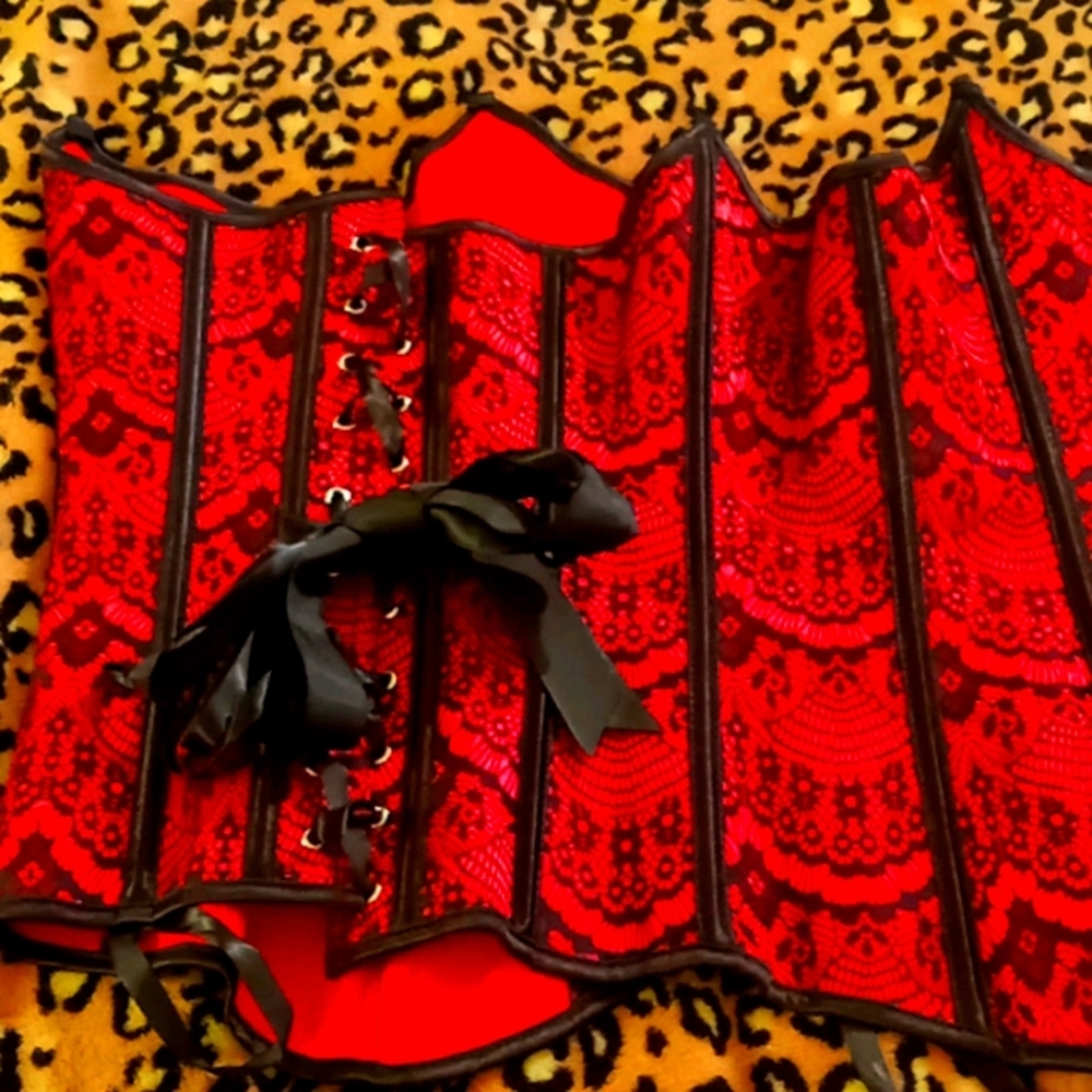 Red and black lace corsets